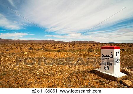 Milestone, National 17, Bou? rfa, province of Figuig, Oriental Region, Morocco View Large Photo Image Stock Image - Milestone, National 17, Bou? rfa, province of Figuig, Oriental Region, Morocco. Fotosearch
