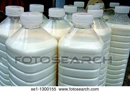 Milk bottles. View Large Photo Image Stock Photography - Milk bottles.. Fotosearch