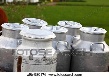Milk urns in a dairy farm Azores islands, Portugal View Large Photo Image Stock Photograph - Milk urns in a dairy farm Azores islands, Portugal. Fotosearch