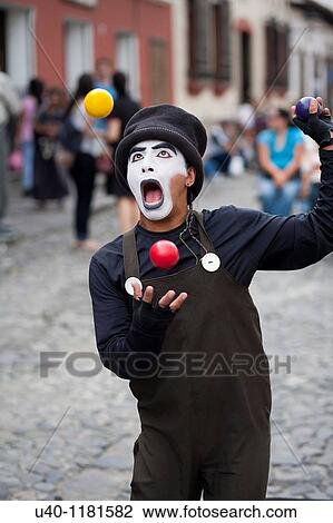 Stock Image - Mime juggling. Fotosearch