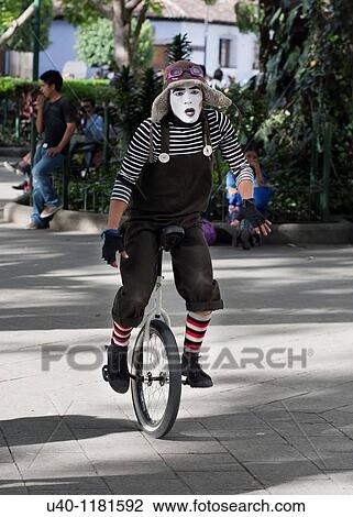 Stock Image - Mime on Unicycle. Fotosearch