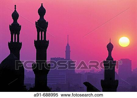 Minarets of Hassan mosque at sunset, view from citadel. City of Cairo. Egypt. View Large Photo Image Stock Photography - Minarets of Hassan mosque at sunset, view from citadel. City of Cairo. Egypt.. Fotosearch