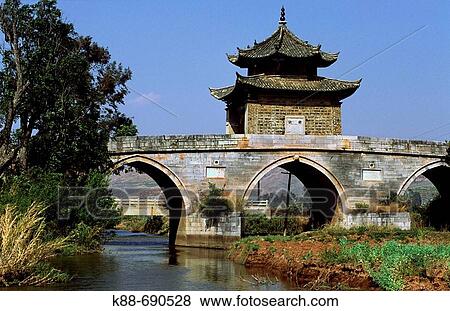 Ming dynasty bridge, near Jianshui. Yunnan, China. View Large Photo Image Stock Photo - Ming dynasty bridge, near Jianshui. Yunnan, China.. Fotosearch