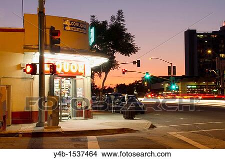 Picture - Mission Hills Liquor Store at Sunset. Fotosearch