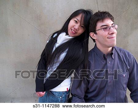 Stock Photo - Mixed race couple. Fotosearch