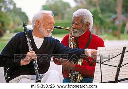Stock Photograph - mixed racial street musicians. Fotosearch