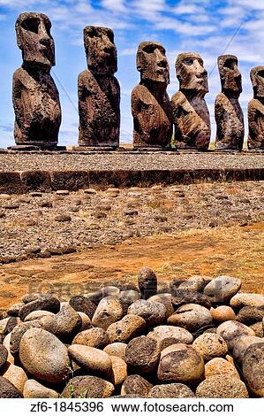 Moai Statues at Ahu Nau Nau Platform in Easter Island during Tapati Festival Rapa Nui View Large Photo Image Stock Photograph - Moai Statues at Ahu Nau Nau Platform in Easter Island during Tapati Festival Rapa Nui. Fotosearch