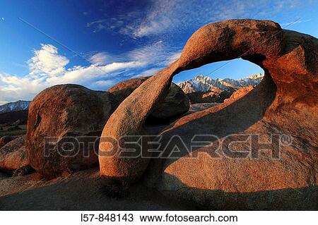 Mobius Arch, Lone Pine Peak, 12994, feet, Mt Whitney, 14497, feet, highest peak of lower 48, natural arch formed out of granit rock, sunrise, Alabama Hills, Sierra Nevada, Lone Pine, California, USA View Large Photo Image Stock Image - Mobius Arch, Lone Pine Peak, 12994, feet, Mt Whitney, 14497, feet, highest peak of lower 48, natural arch formed out of granit rock, sunrise, Alabama Hills, Sierra Nevada, Lone Pine, California, USA. Fotosearch