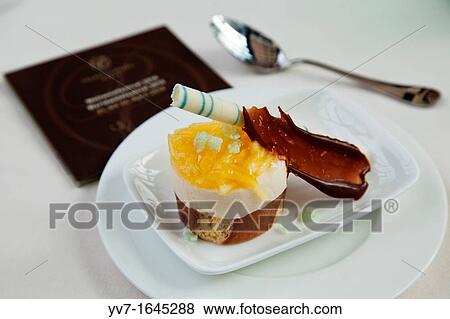 Mocha and mango timbale with crunchy chocolate Vienna, Austria View Large Photo Image Stock Photo - Mocha and mango timbale with crunchy chocolate Vienna, Austria. Fotosearch