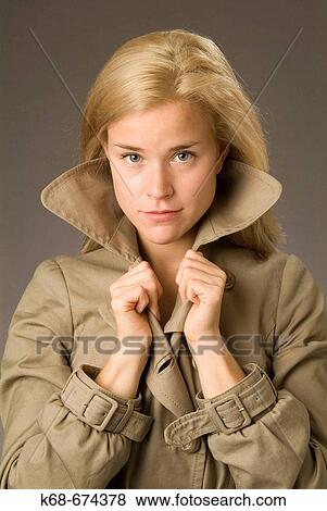 model, female, twenties, studio with coat View Large Photo Image Stock Photo - model, female, twenties, studio with coat. Fotosearch