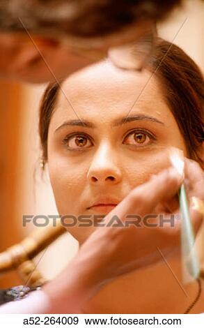 Model getting make up View Large Photo Image Stock Photo - Model getting make up. Fotosearch