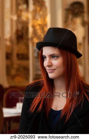 Model released woman in the opulent 19th century New York coffee house, Budapest, Hungary, Europe. View Large Photo Image Stock Image - Model released woman in the opulent 19th century New York coffee house, Budapest, Hungary, Europe.. Fotosearch