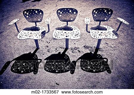 Modern chairs in a park, Barcelona, Spain. View Large Photo Image Stock Photo - Modern chairs in a park, Barcelona, Spain.. Fotosearch