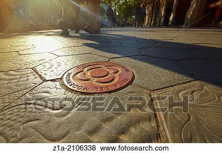 Modernism route sign on the Gaud? paving stone design at the Passeig de Gracia avenue. Barcelona. Catalonia. Spain. View Large Photo Image Stock Photo - Modernism route sign on the Gaud? paving stone design at the Passeig de Gracia avenue. Barcelona. Catalonia. Spain.. Fotosearch