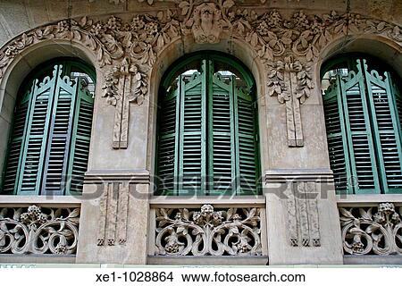 Picture - Modernist windows and facade from a building in Roger de Lluria street, Barcelona, Catalonia, Spain.. Fotosearch