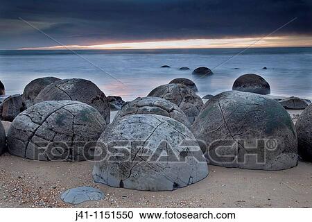 Stock Image - Moeraki boulders, septarian concretions, Moeraki, North Otago Coast, New Zealand,. Fotosearch