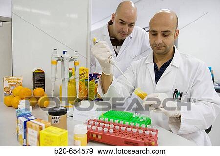 Stock Photo - Molecular Biology Laboratory. Preparing samples to detect the addition of tangerine to orange juice with DNA techniques. AZTI-Tecnalia. Technological Centre specialised in Marine and Food Research. Sukarrieta, Bizkaia, Euskadi. Spain.. Fotosearch