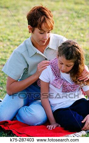 mom and daughter having serious conversation View Large Photo Image Stock Image - mom and daughter having serious conversation. Fotosearch