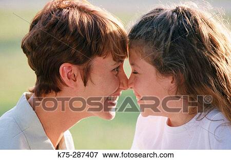 mom and daughter, nose to nose View Large Photo Image Stock Photo - mom and daughter, nose to nose. Fotosearch