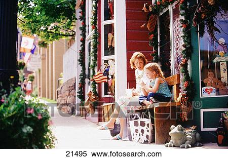 Mom and daughter shopping on Main Street. Park City. Utah. USA View Large Photo Image Stock Photography - Mom and daughter shopping on Main Street. Park City. Utah. USA. Fotosearch