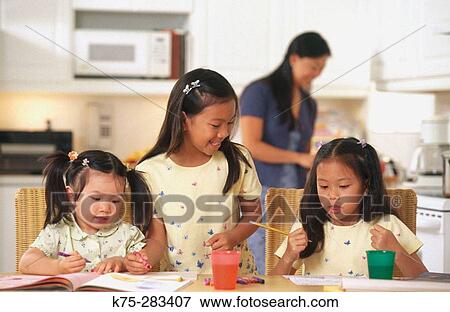 Stock Photo - mom and her daughters. Fotosearch