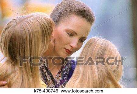 Mom and her two daughters View Large Photo Image Stock Photograph - Mom and her two daughters. Fotosearch