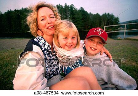 Picture - Mom poses with two children. Pennsylvania, USA. Fotosearch