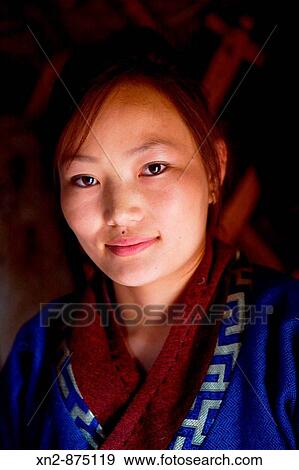 Mongolia. Young, beautiful guide in Traditional Costume of a recreated 13th Century Ger Village View Large Photo Image Stock Photo - Mongolia. Young, beautiful guide in Traditional Costume of a recreated 13th Century Ger Village. Fotosearch