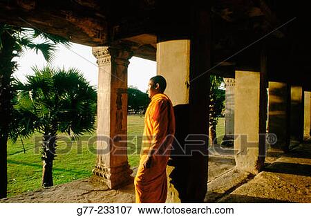 Monk at Angkor Wat Temple. Cambodia View Large Photo Image Stock Photo - Monk at Angkor Wat Temple. Cambodia. Fotosearch