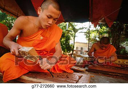 Monk carving wood in Buddhist temple. Vientiane, Laos View Large Photo Image Stock Image - Monk carving wood in Buddhist temple. Vientiane, Laos. Fotosearch