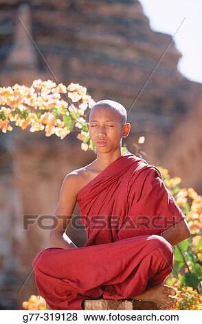 Monk in meditation. Bagan. Myanmar (Burma) View Large Photo Image Stock Photo - Monk in meditation. Bagan. Myanmar (Burma). Fotosearch