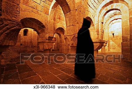 Stock Photo - Monk in the crypt of the Monastery of Leyre Navarra, Spain. Fotosearch