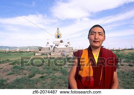 Monk Near Sacred Stupas at Erdene Zuu Monastery 1586 in Mongolia. View Large Photo Image Stock Photo - Monk Near Sacred Stupas at Erdene Zuu Monastery 1586 in Mongolia.. Fotosearch