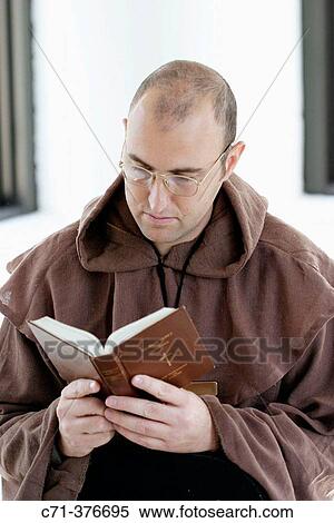 Monk. Priest reading Bible. View Large Photo Image Stock Photography - Monk. Priest reading Bible.. Fotosearch