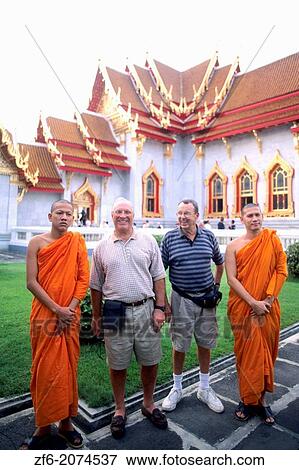 Monks and Tourists at Marble Temple Bangkok Thailand. View Large Photo Image Stock Photo - Monks and Tourists at Marble Temple Bangkok Thailand.. Fotosearch