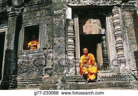 Monks at Angkor Wat Temple. Cambodia View Large Photo Image Stock Photo - Monks at Angkor Wat Temple. Cambodia. Fotosearch