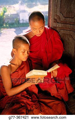 Monks in wood monastery. Inle Lake. Shan State. Myanmar. View Large Photo Image Stock Image - Monks in wood monastery. Inle Lake. Shan State. Myanmar.. Fotosearch