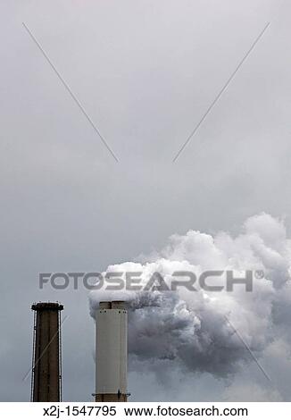 Monroe, Michigan - Emissions from a coal-fired power plant operated by DTE Energy View Large Photo Image Stock Photography - Monroe, Michigan - Emissions from a coal-fired power plant operated by DTE Energy. Fotosearch