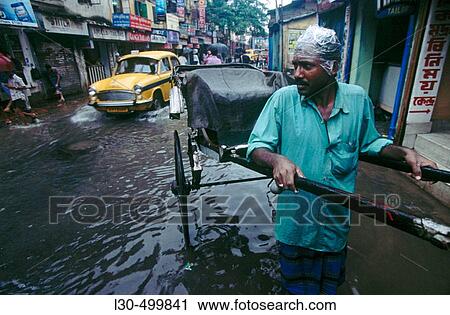 Monsoon in Calcutta. West Bengal, India View Large Photo Image Stock Image - Monsoon in Calcutta. West Bengal, India. Fotosearch