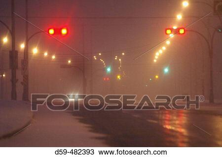 Montreal street, during a snow storm, at night. Quebec. Canada. View Large Photo Image Stock Image - Montreal street, during a snow storm, at night. Quebec. Canada.. Fotosearch