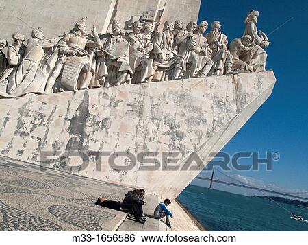 Monument to the Discoveries and 25 April bridge over Tajo river, Lisbon, Portugal View Large Photo Image Stock Photograph - Monument to the Discoveries and 25 April bridge over Tajo river, Lisbon, Portugal. Fotosearch