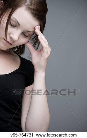 moody teenage girl looking sad and depressed View Large Photo Image Stock Image - moody teenage girl looking sad and depressed. Fotosearch