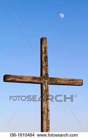 Moon and old wooden cross in the Podlasie region. Poland View Large Photo Image Picture - Moon and old wooden cross in the Podlasie region. Poland. Fotosearch