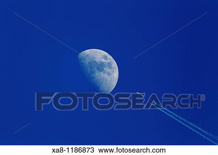 Moon and plane View Large Photo Image Stock Image - Moon and plane. Fotosearch