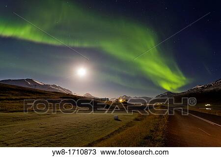 Stock Image - Moon light with Aurora borealis or Northern Lights, Northern Iceland. Fotosearch