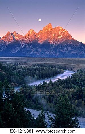 Moonset at dawn over the Teton Range and Snake River, Grand Teton Nat? l Pk, WYOMING View Large Photo Image Stock Image - Moonset at dawn over the Teton Range and Snake River, Grand Teton Nat? l Pk, WYOMING. Fotosearch