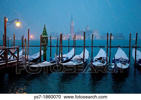 Moored gondolas covered with snow, St Mark's basin, Venice, Italy, Europe View Large Photo Image Stock Image - Moored gondolas covered with snow, St Mark's basin, Venice, Italy, Europe. Fotosearch