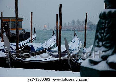 Moored gondolas covered with snow, St Mark's basin, Venice, Italy, Europe View Large Photo Image Stock Image - Moored gondolas covered with snow, St Mark's basin, Venice, Italy, Europe. Fotosearch