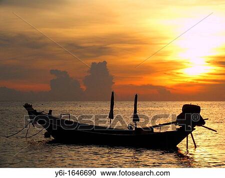 Moored longtail boat in sunset Ko Tao island Thailand View Large Photo Image Stock Image - Moored longtail boat in sunset Ko Tao island Thailand. Fotosearch
