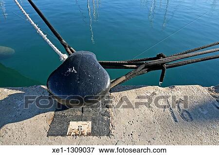 Stock Photo - Mooring bollard, Port Vell, Barcelona, Catalonia, Spain.. Fotosearch